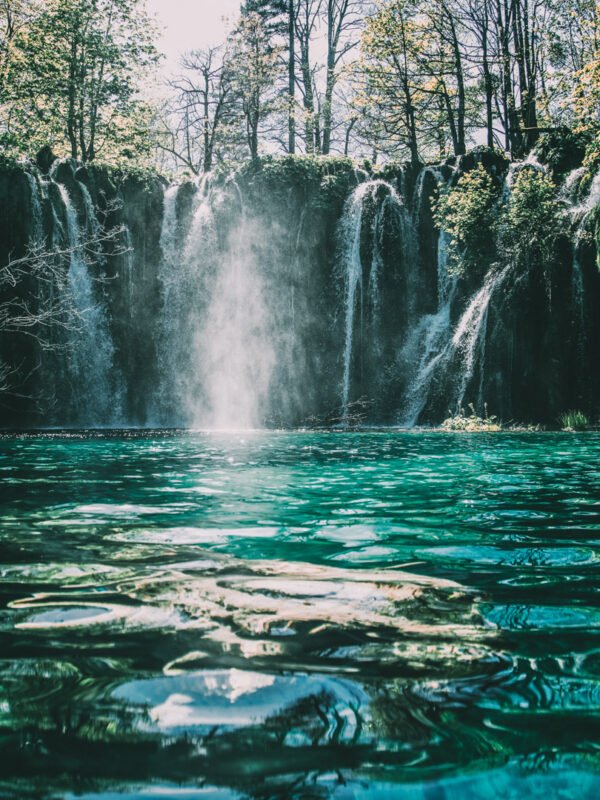 Swimming in a waterfall on a school expedition to Croatia