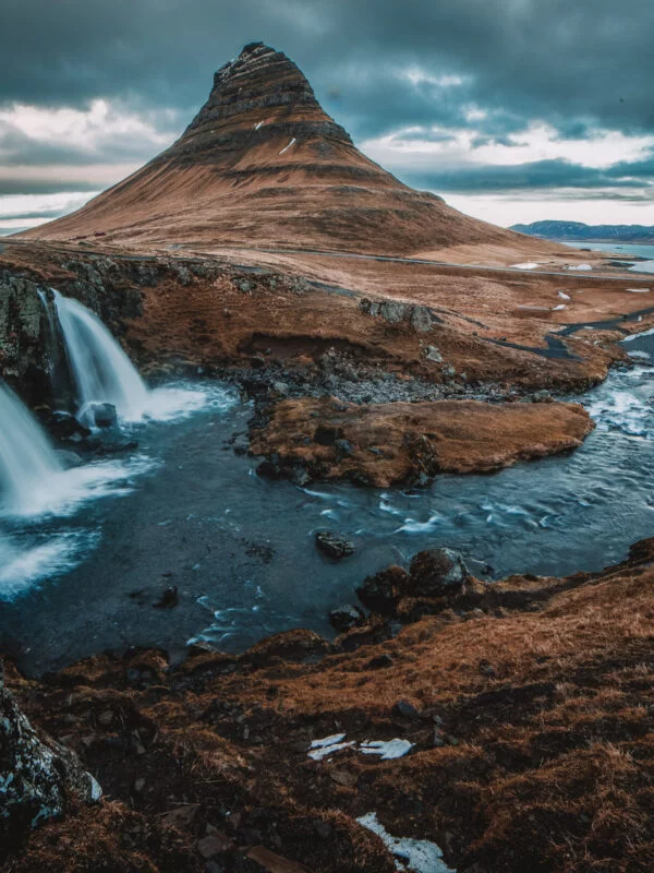 Exploring a waterfall on a school trip to Norway