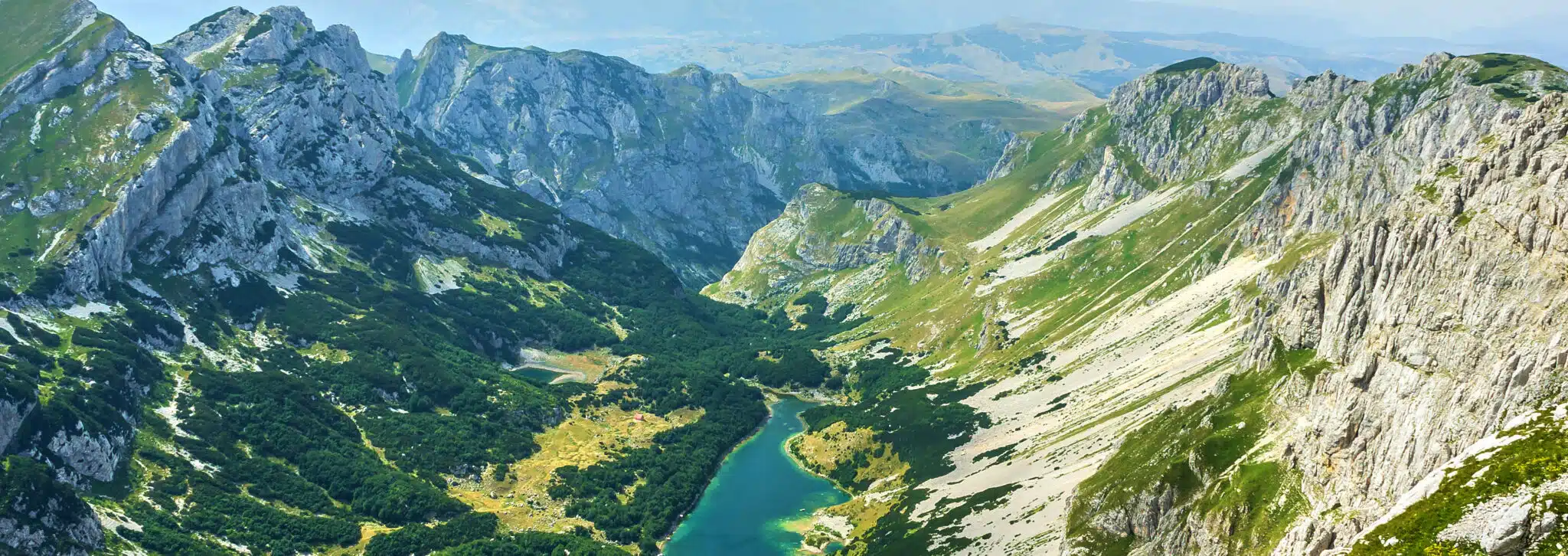 A panoramic view of a mountain range in Montenegro