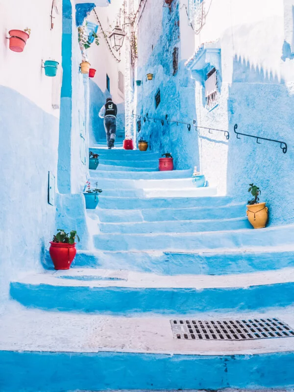 Exploring a white back street in Morocco on a school trip