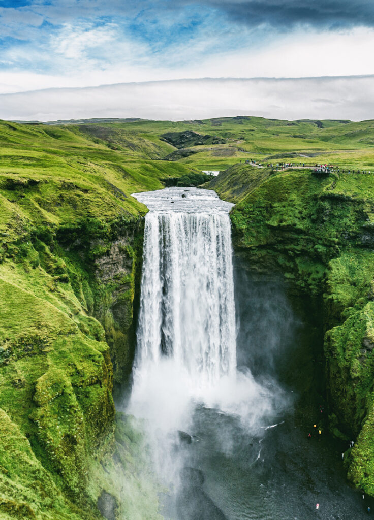 Skogafoss Waterfall in Iceland on a school geography field trip