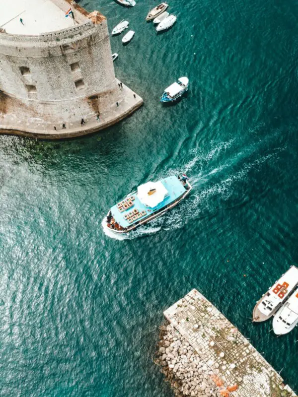 A boat entering a port in Montenegro on a school trip