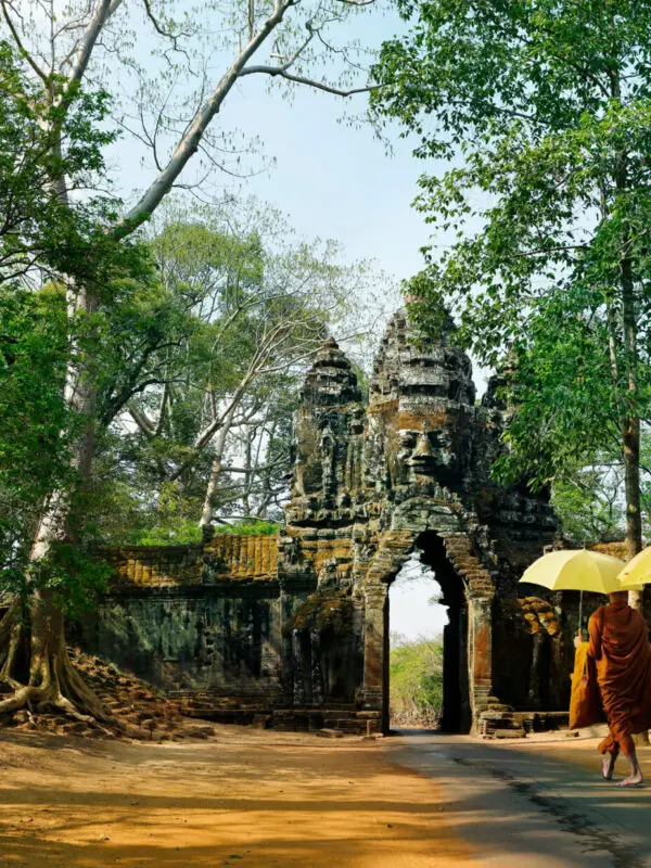 Meeting Cambodian monks at the entrance to Angkor Wat temple