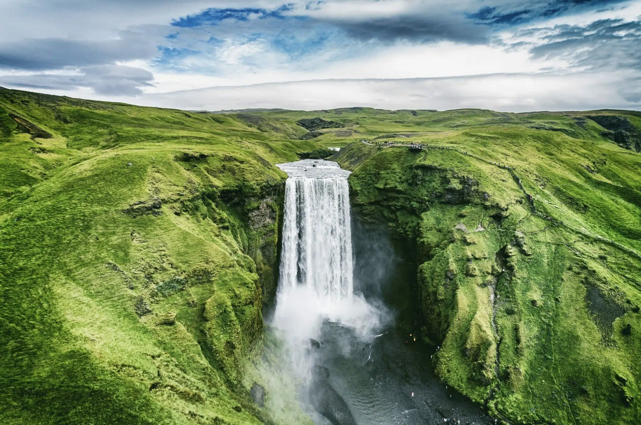 Visiting an Icelandic waterfall on a Curriculum School Trip